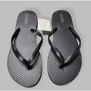 silver and black flip flops
